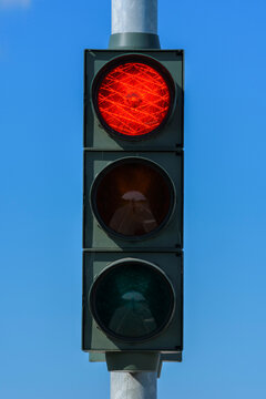 Red Traffic Light Against Blue Sky, Denmark