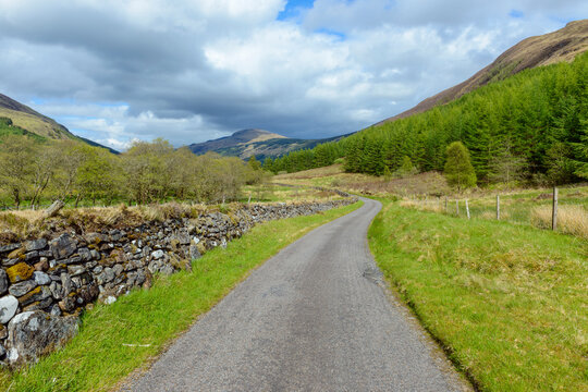 Scottish single track road in spring along the River Orchy in Scotland, United Kingdom