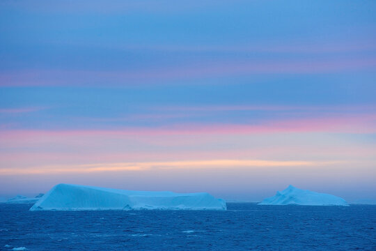 Icebergs on the Antarctic Sound at sunrise at the Antarctic Peninsula, Antarctica