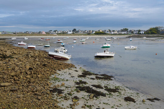 Harbor with boats at low tide, Plage de Porssevigne, Plouarzel, Finistere, Brittany, France