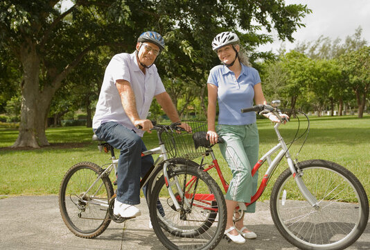 Couple Riding Bikes in the Park