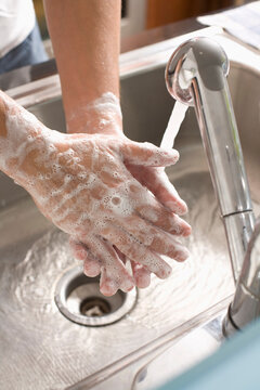 Man Washing his Hands