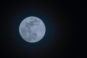 full moon on black sky background