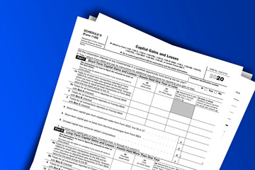 Fototapeta premium Form 1120 (Schedule D) documentation published IRS USA 44147. American tax document on colored