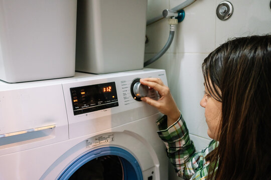 Woman Puts Washing Machine At Home