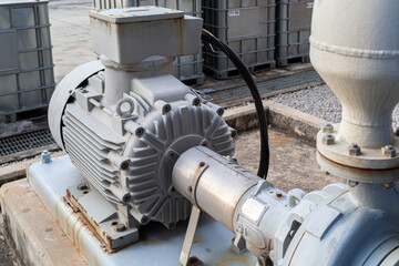 The pump that is adjacent to the electric motor. installed in a chemical factory or oil refinery....