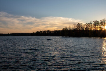 Person in Kayak in Lake Anna Virginia Paddling Across the Lake on a Fall Day at Sunset