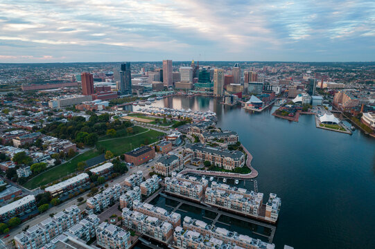 Aerial Drone View of Baltimore City Harbor with Boats Parked at Docks