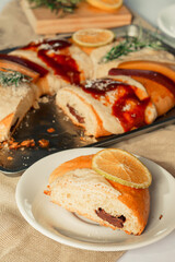 Sliced rosca de reyes on a plate. Food.