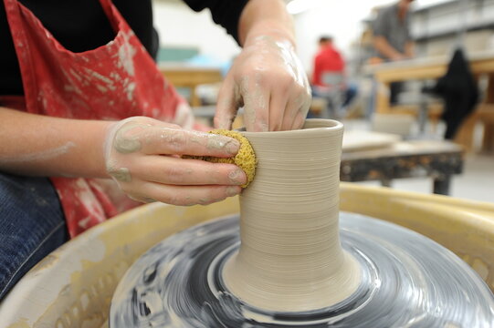 Female Hands Work On Pottery