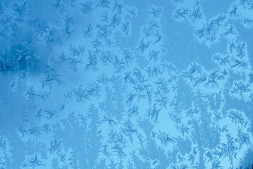 frost crystal on window glass in winter season