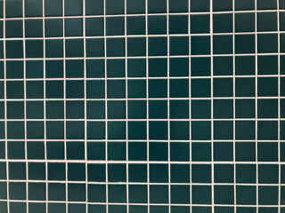 dark green geometric shape tile and white line wall in full frame shot, using for background