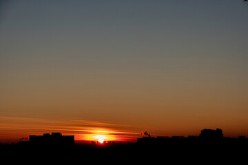 sunset over city, urban landscape
