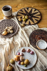 Brightly colored radishes and other fall vetables on a plate - healthy, vegan food ingredients