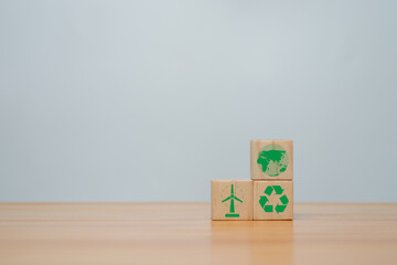 Long-term, climate-neutral strategy,   wooden cubes with carbon emission reduction and green icon, Low carbon, carbon neutral concept,green banne.