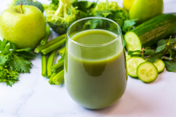 A glass of green celery juice. Celery drink prepared for healthy nutrition and detox.