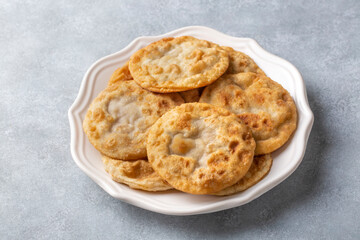 Delicious meat pie from Turkish cuisine. Fried handmade pies. Turkish name; fincan boregi or puf borek
