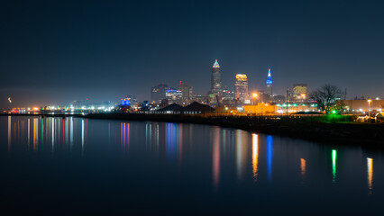 Fototapeta na wymiar Cleveland at nighttime long exposure with colorful reflecting lights.