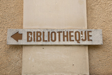 bibliotheque sign french text on facade means library on Village Building Municipal bookcase in city center