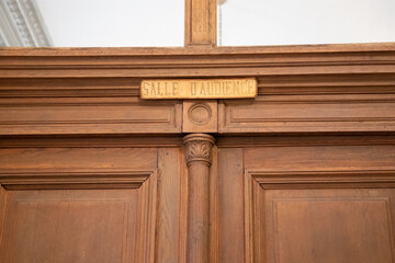 salle d'audience text on ancient wall facade building means in french court house justice courtroom