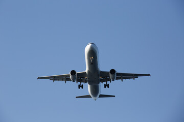 passenger plane in the blue sky