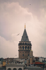 Fototapeta na wymiar View of Galata Tower of Istanbul in Turkey. Sky and cloud background. View of Istanbul. Turkish name: Galata Kulesi. August, 2022.