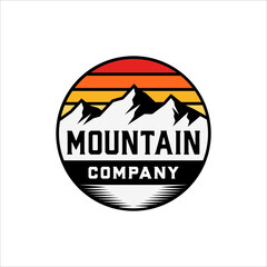 Mountain logo in round badge with retro style design