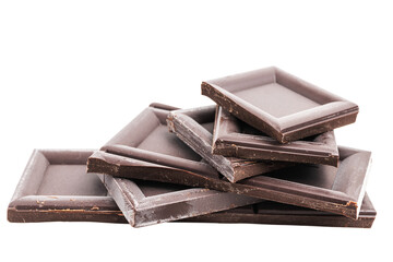 Dark chocolate pieces, cubes on a heap, broken chocolate isolated on transparent background