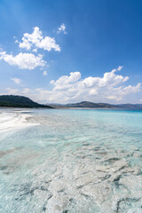The turquoise waters of Salda Lake, the white mineral-rich beach and the blue sky. Salda Lake is a turquoise crater lake.
Salda Lake, Burdur, Turkey