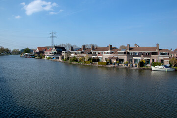 Fototapeta na wymiar Houses At Driemond Along The Gaasp River The Netherlands 2019