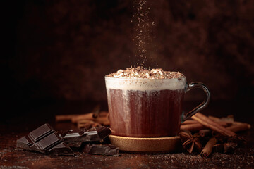 Hot chocolate with whipped cream sprinkled with chocolate crumbs.