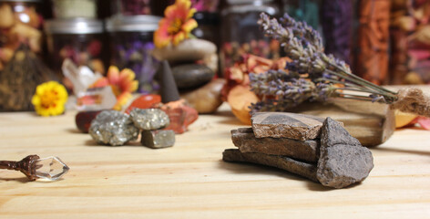Ancient Native American Pottery Pieces With Crystals and Flowers on Meditation Table
