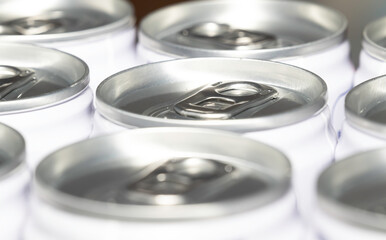 Selective focus, shallow depth of field, close up of a group of metal can