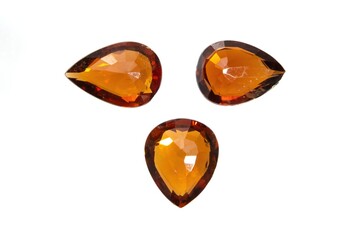 Natural spessartine garnet gemstone isolated on white background