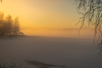 Fototapeta na wymiar Sunset ove lake Bysön in Grangärde Sweden
