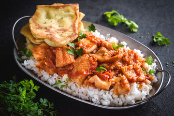 Delicious fish curry with naan bread