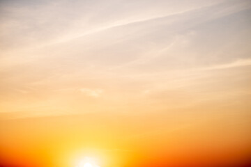 beautiful gradient orange clouds and sunlight on the blue sky perfect for the background, take in everning,Twilight