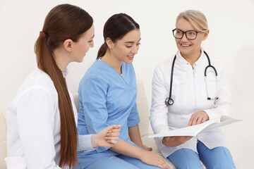 Fototapeta premium Team of professional doctors working in office