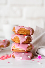 Heart shaped donut with strawberry glaze - Valentines day concept
