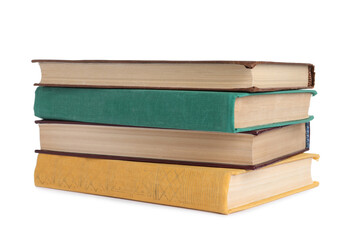 Stack of many old hardcover books isolated on white
