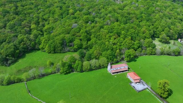 Aerial view from a drone of the surroundings of the Sanctuary of Valvanuz. Selaya. Pasiegos Valleys. Cantabria. Spain. Europe