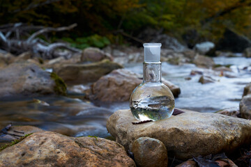 Clean drinking water. Flask with water.