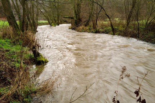 winding river with high flood water