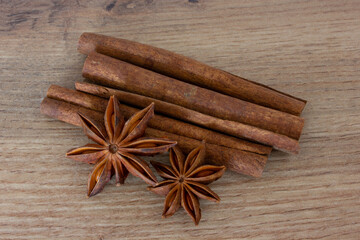 Badian with cinnamon on the table. Aromatic cinnamon sticks and star anise close-up.