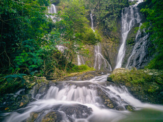 Fototapeta premium Nyandung Waterfall, one of the waterfalls in Kuningan, West Java. This waterfall is still very beautiful so it is very suitable to be a place to unwind from work.
