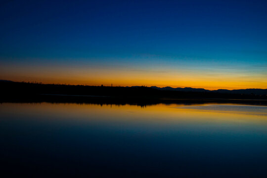 sunset over the lake © Ekin