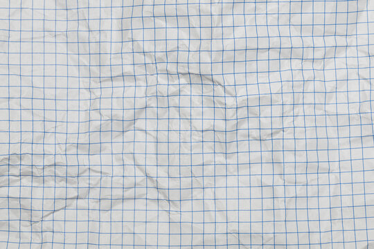 Hoja de papel blanca cuadriculada de un cuaderno, arrugada	