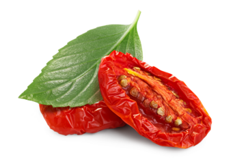 Dried or Sundried tomato halves with thai basi l isolated png