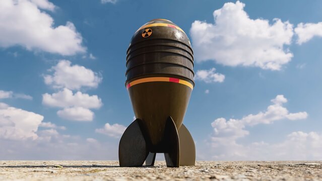 Nuclear bomb, atomic missile on the ground, against a blue cloudy sky, 3d render