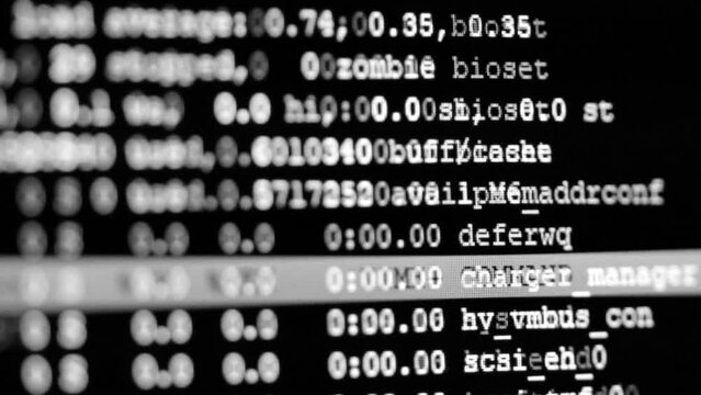 Code. Server logs on a monitor scroll by showing information related to scanning and network activity. File check and security. Concept background for video about technology and digital transformation